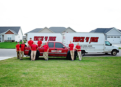 Truck 'N Junk's junk removal trucks and team