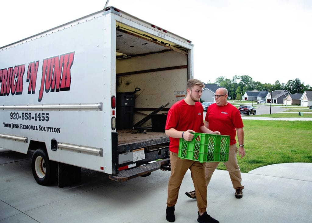 Truck 'N Junk employees working cleanouts services